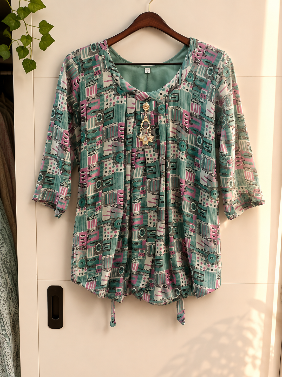 file_00000000bfac8211aafad387d7c27f31 Abstract print A-line tunic kurti - Image 1